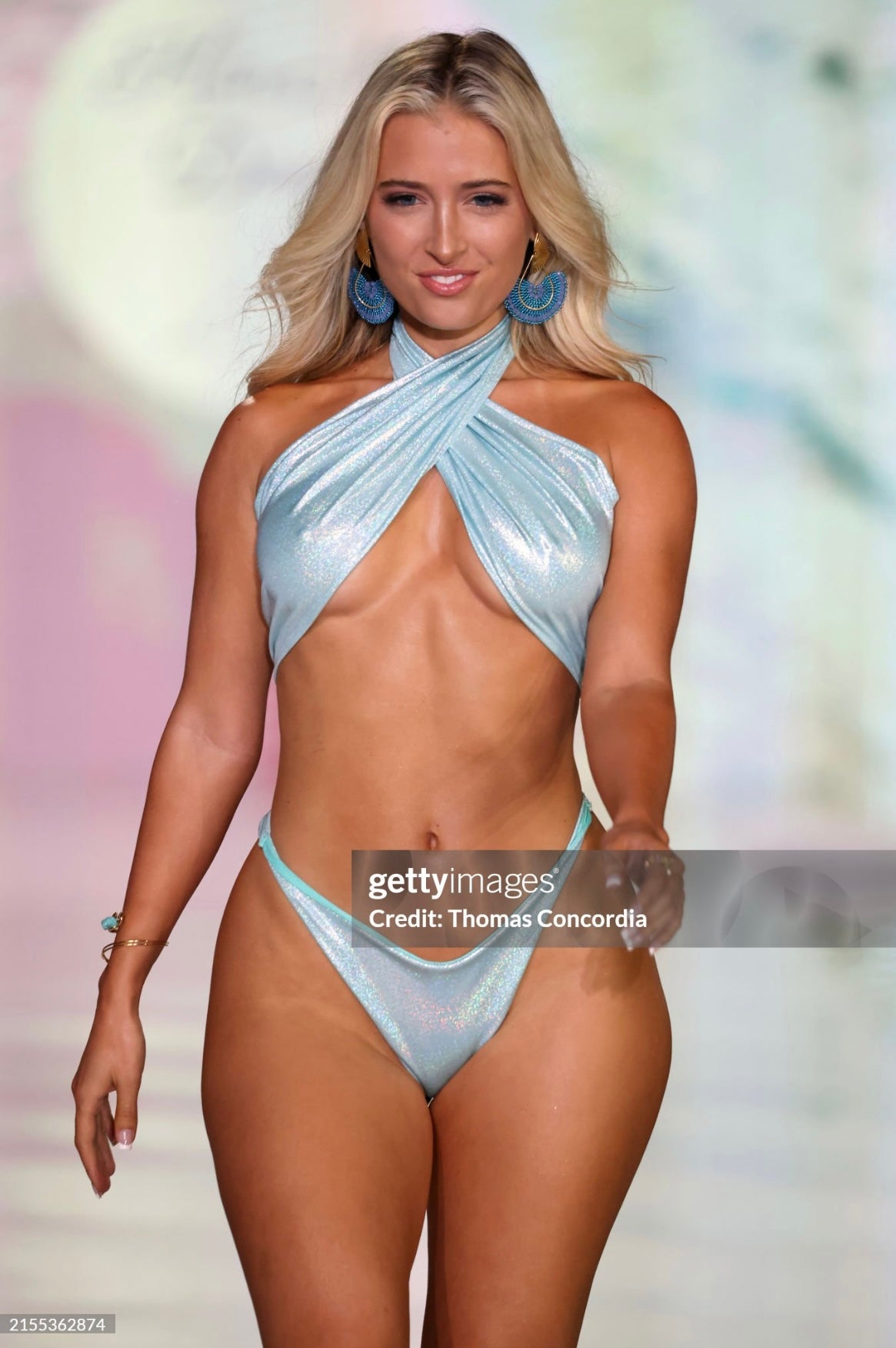 Baby blue shimmer halterneck bikini top with matching thong bottoms