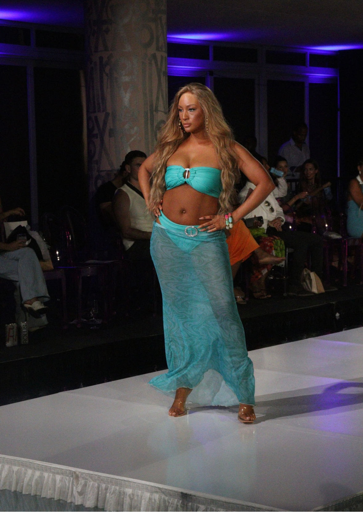 Turquoise bandea bikini with full brief bottoms and sheer patterned skirt