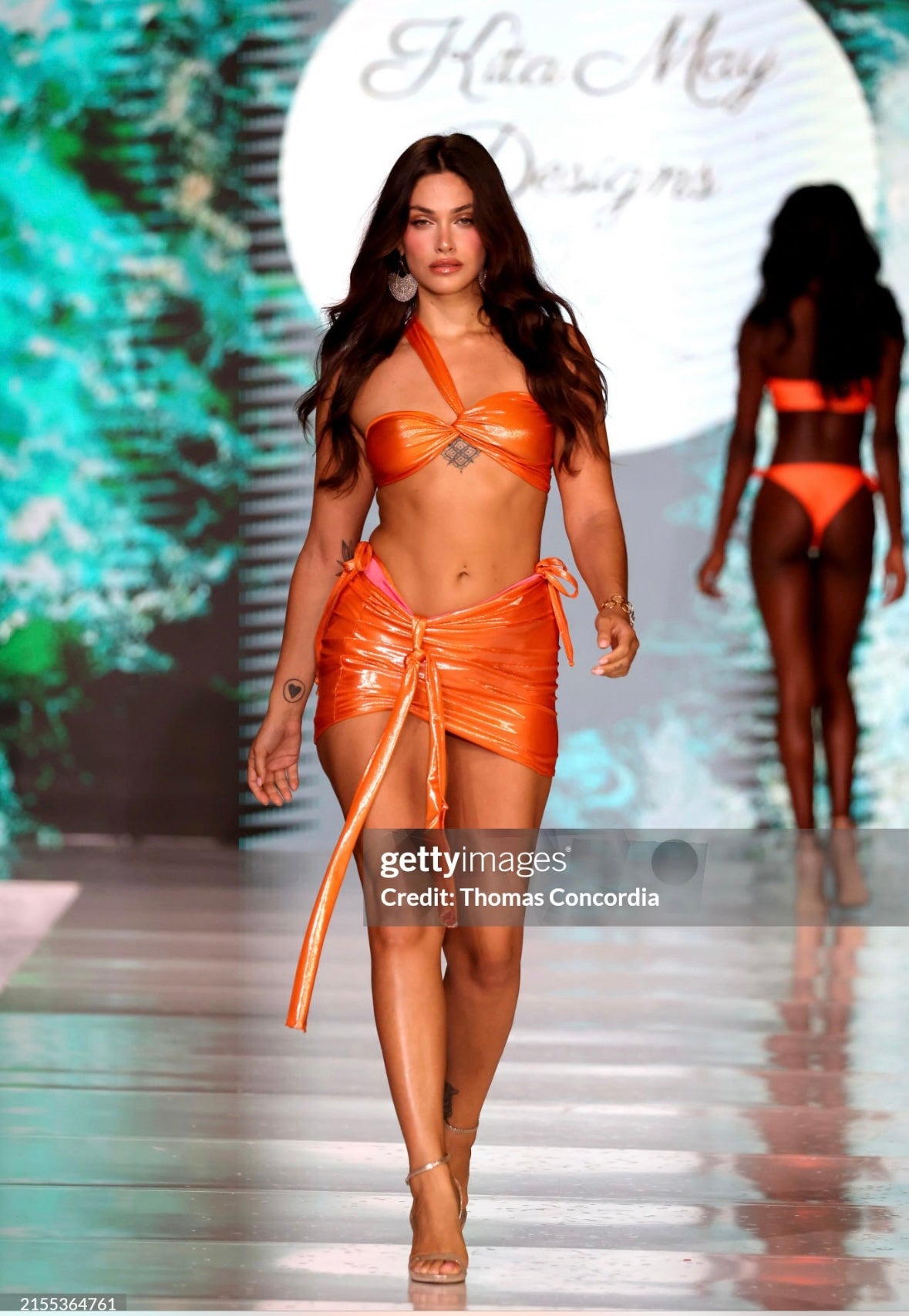 Shimmer orange twisted knot bikini and matching skirt